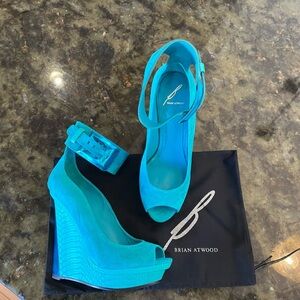NWOT Brian Atwood teal platforms. 8.5 suede